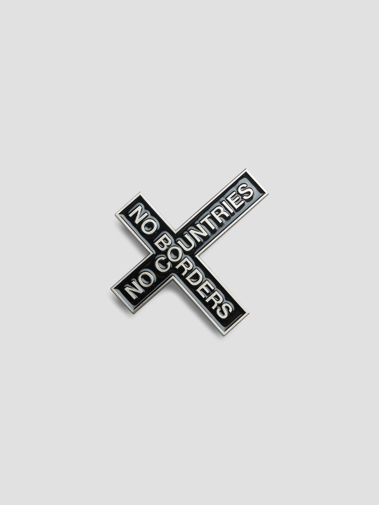 NO BORDERS PIN METAL
