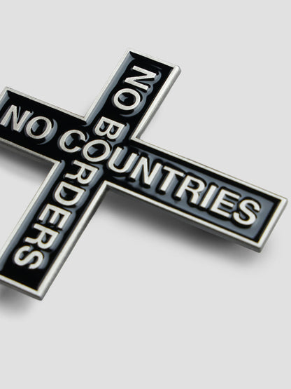 NO BORDERS PIN METAL