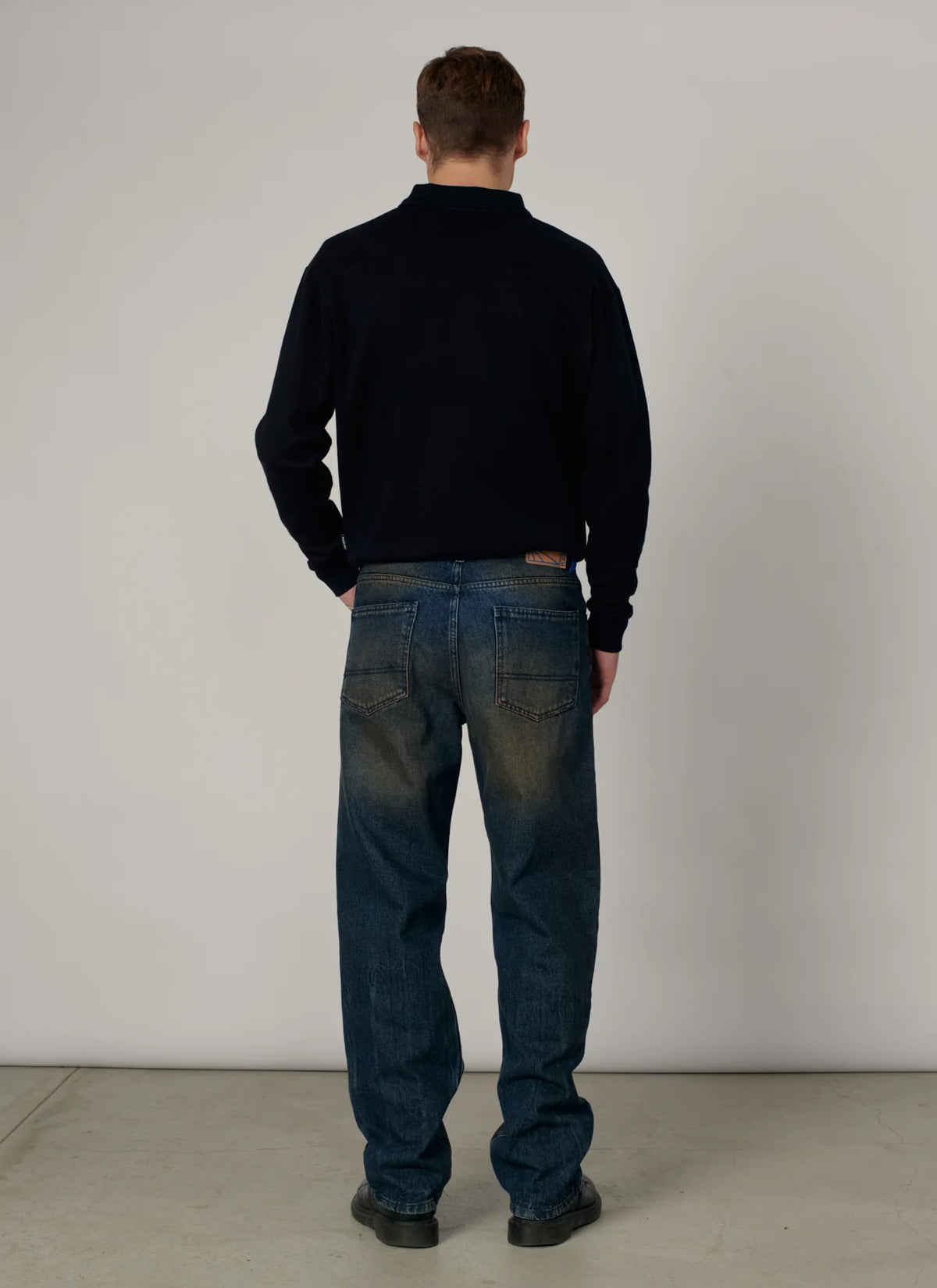 WASHED TAPERED DENIM PANTS