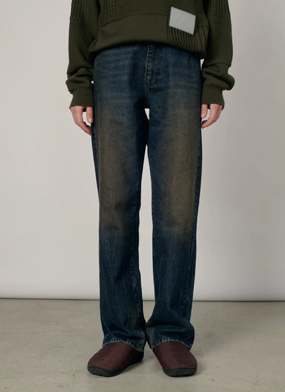 WASHED TAPERED DENIM PANTS