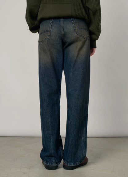 WASHED TAPERED DENIM PANTS